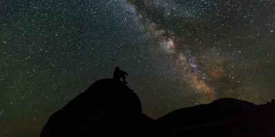man looking at the Milky Way