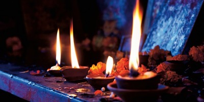 lit candles on altar