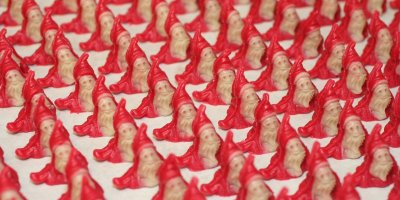 rows of elf-shaped marzipan Christmas candy