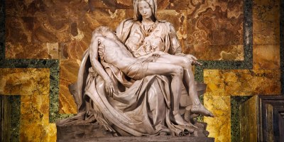 The Pieta, a sculpture by Michelangelo, featuring Mary holding the slain body of Jesus after his crucifixion